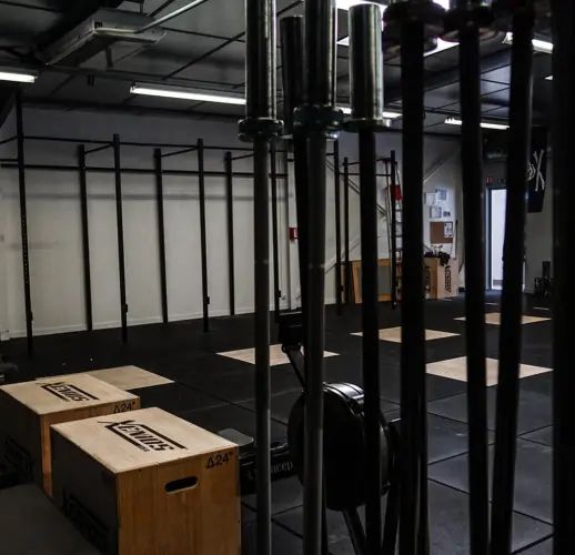 CrossFit training area with Concept 2 machines and Assault Bike